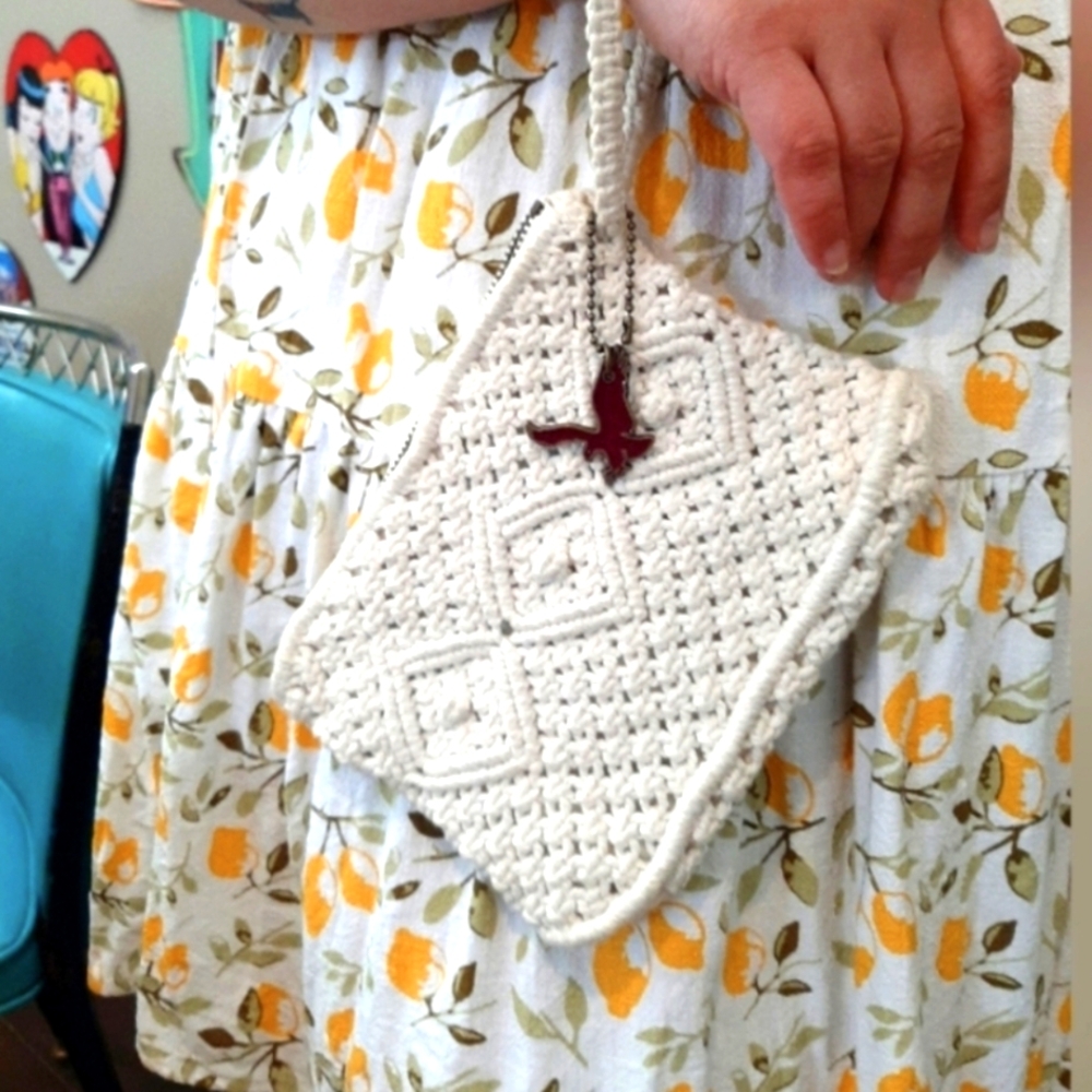 American Eagle Outfitters white crocheted clutch with metal zipper eagle charm